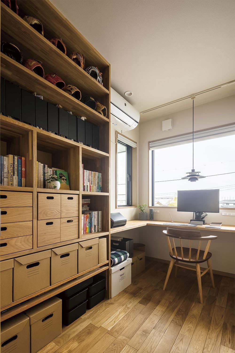 Ｌ型に大開口を配置した開放感と木の温もりのある家